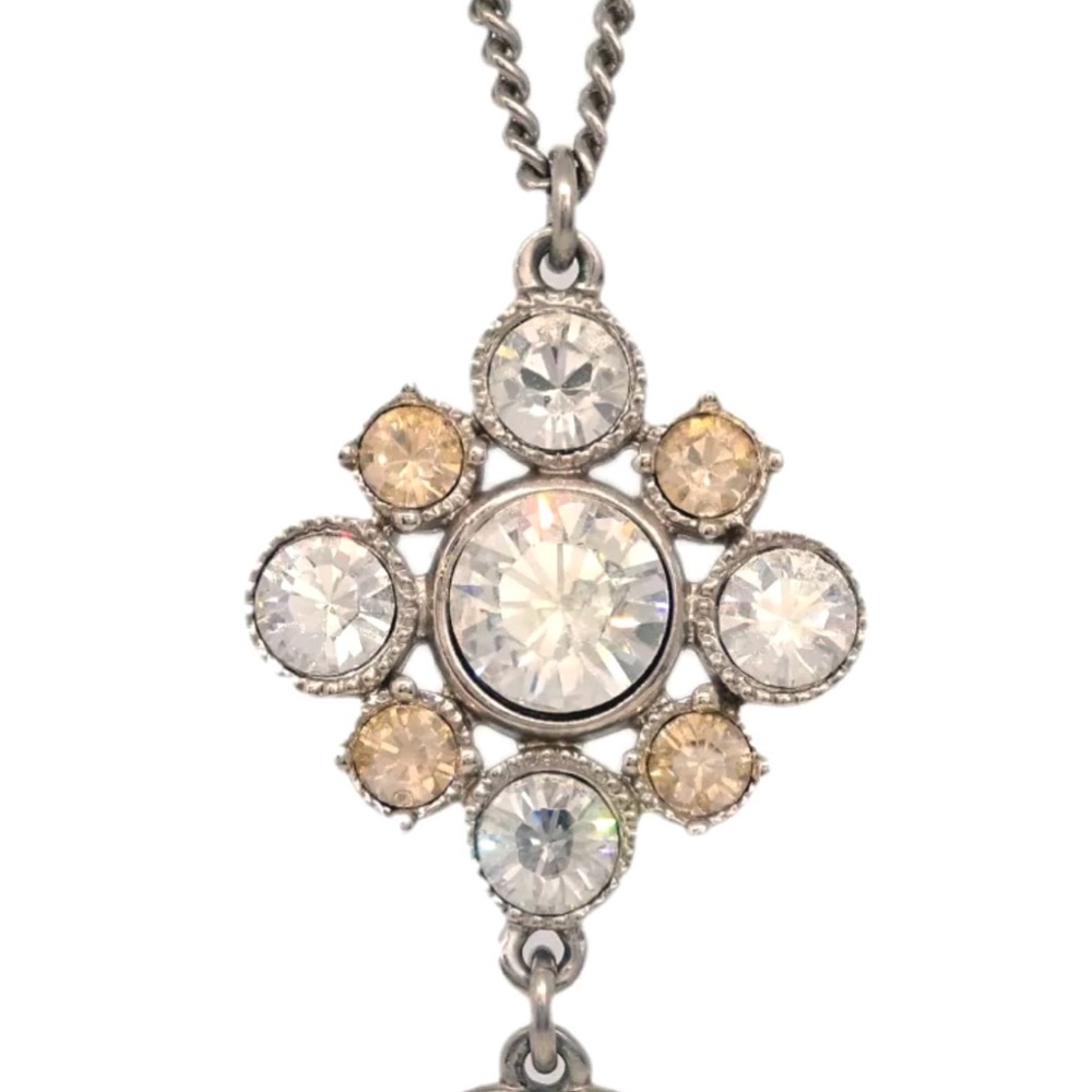 CHANEL VINTAGE 2009 Rhinestone & Silver necklace with dangling CC pendant.